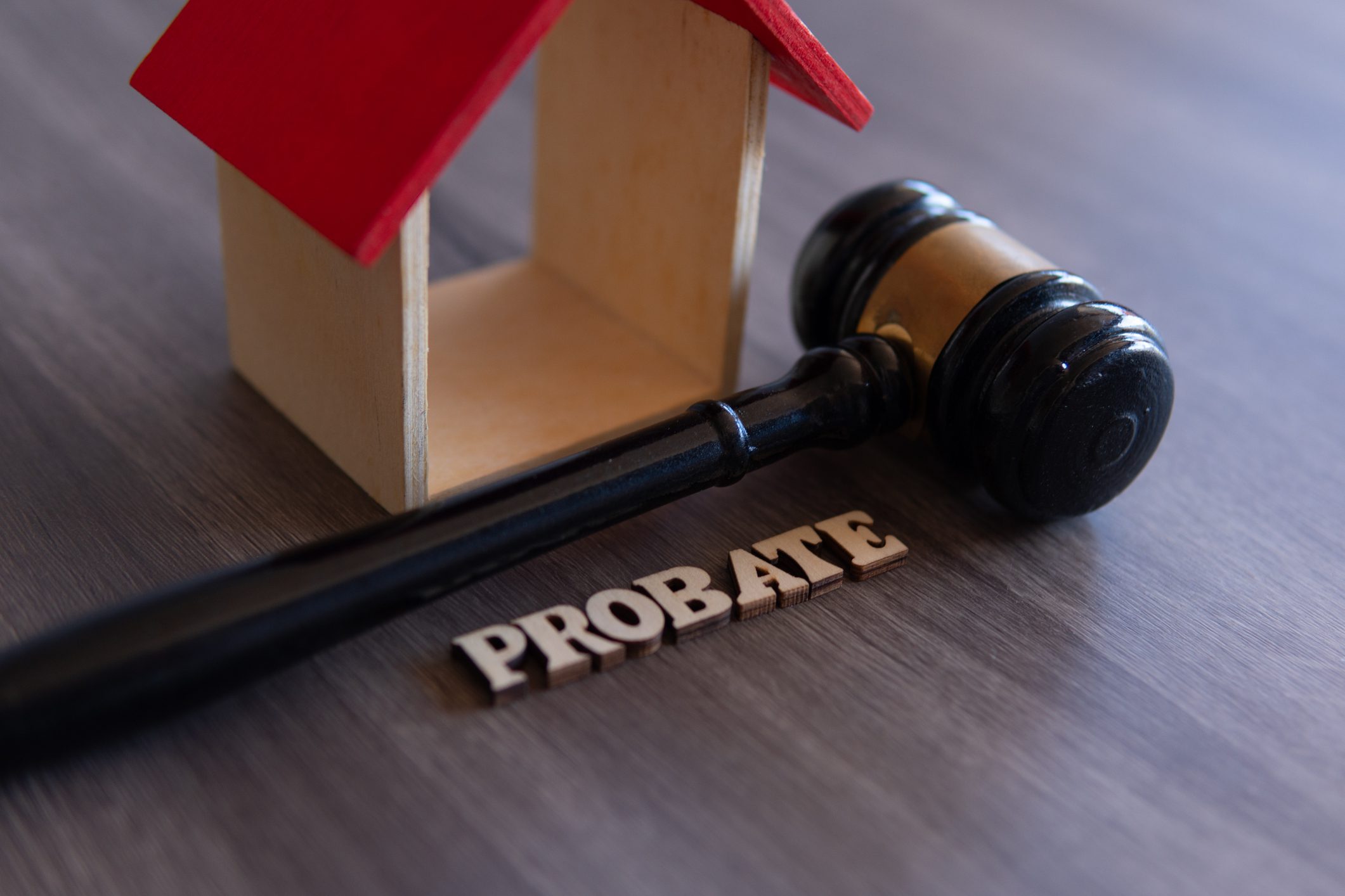 Probate concept with gavel and house